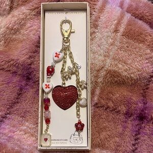 Keychain Charming Red Heart Bag Charm with Gold accents.